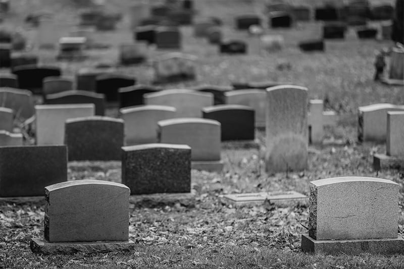 burial tombstones in graveyard