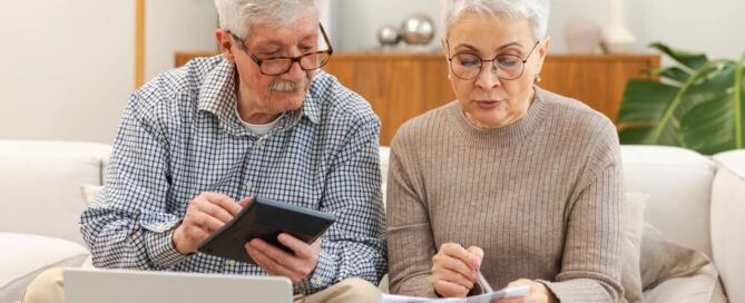 older couple looks at finances