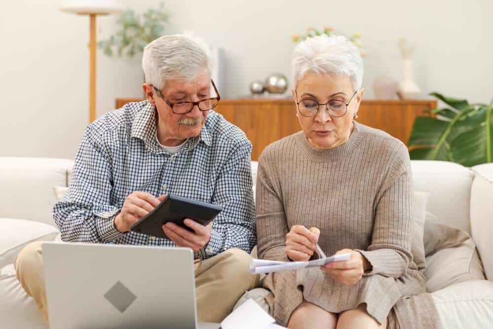 older couple looks at finances